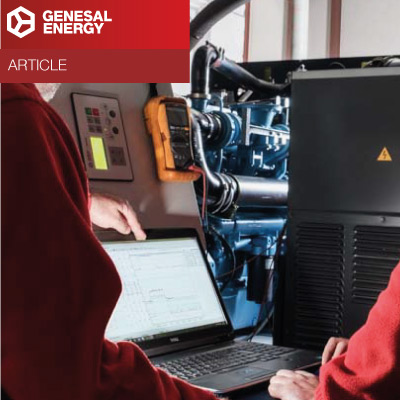 Technical article. Man working with computer next to a generator set